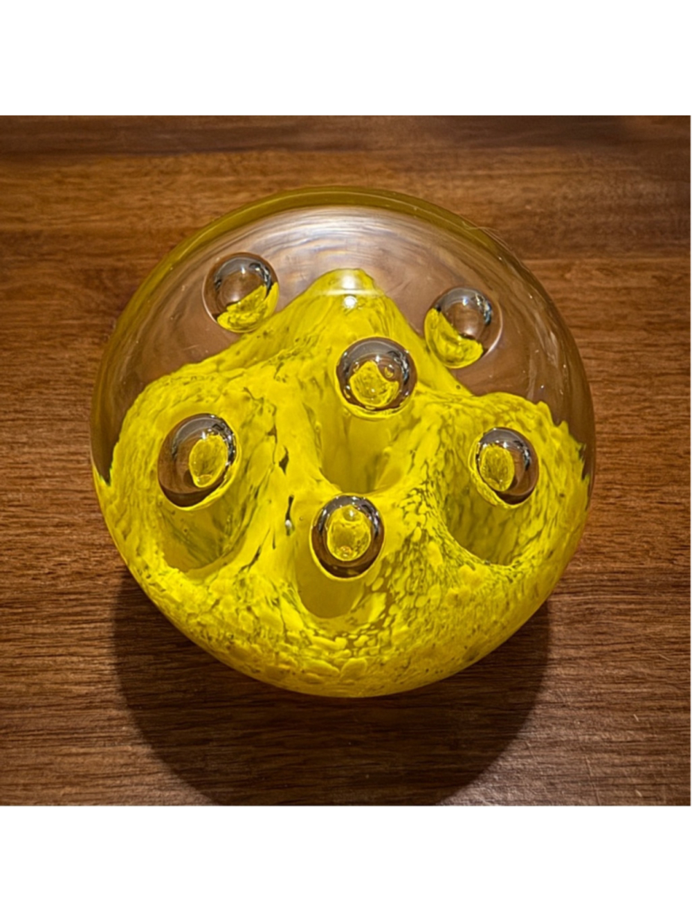 7. Glass Paperweight Collectible